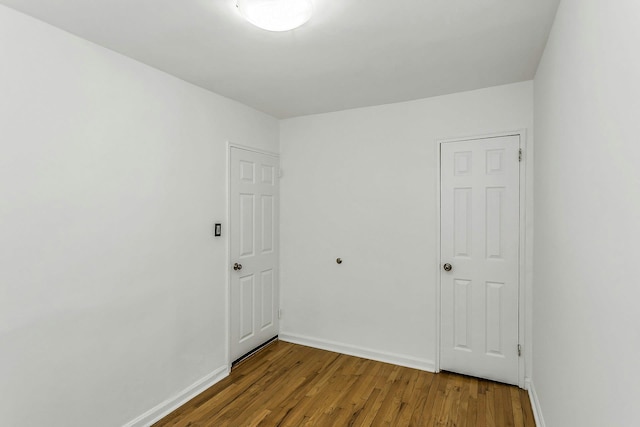 219-36 75th Ave Unit 243A2, Bayside, NY 11364 - unfurnished room with wood finished floors and baseboards