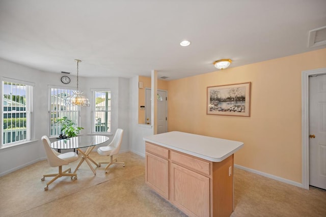 dining room with baseboards and recessed lighting