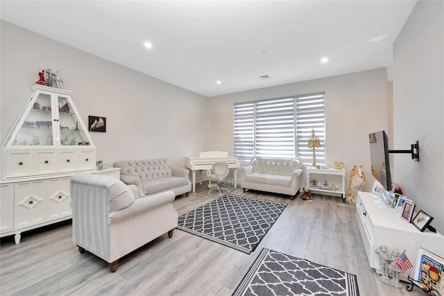 308 Breton Way Unit 308, Glen Cove, NY 11542 - living room featuring light wood-type flooring and recessed lighting