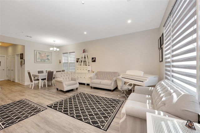 308 Breton Way Unit 308, Glen Cove, NY 11542 - living room with a chandelier, light wood-style floors, baseboards, and recessed lighting