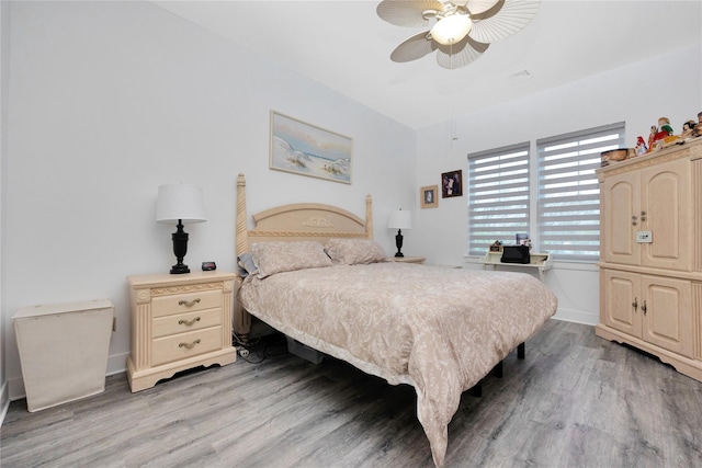 308 Breton Way Unit 308, Glen Cove, NY 11542 - bedroom with light wood-style flooring, ceiling fan, and baseboards