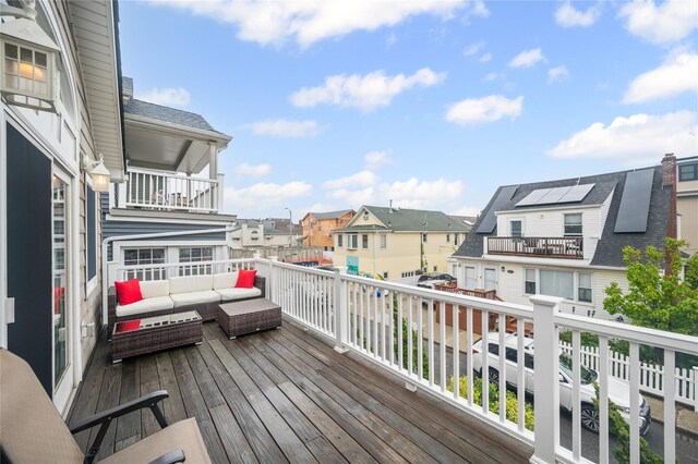 49 Oregon St, Long Beach, NY 11561 - wooden terrace featuring a residential view and an outdoor hangout area