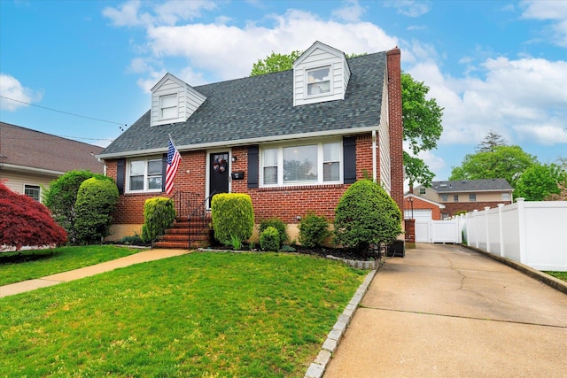 2611 Kenny Ave, Merrick, NY 11566 - cape cod home featuring brick siding and a shingled roof