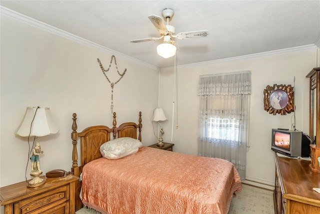 bedroom featuring crown molding, a ceiling fan, and baseboards