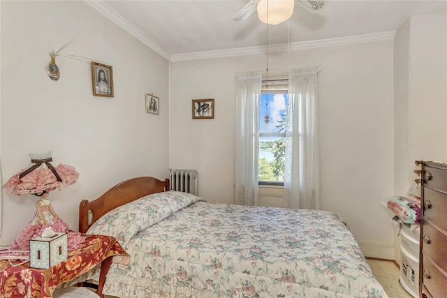 bedroom with radiator, ornamental molding, a ceiling fan, and baseboards