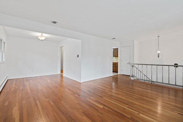 90 Cocks Ln, Locust Valley, NY 11560 - unfurnished room featuring wood finished floors and baseboards
