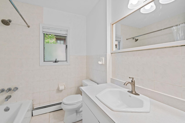 90 Cocks Ln, Locust Valley, NY 11560 - full bath featuring a baseboard radiator, tile walls, shower / bath combo with shower curtain, toilet, and vanity