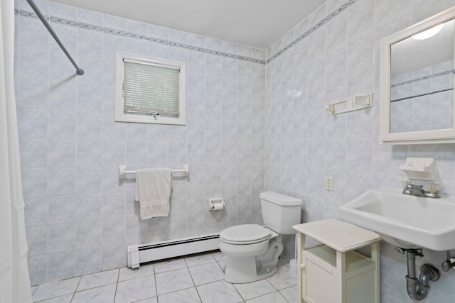 90 Cocks Ln, Locust Valley, NY 11560 - full bath featuring a baseboard heating unit, toilet, a sink, and tile walls