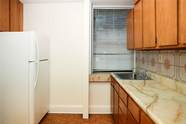 808 Bronx River Rd Unit 1A, Yonkers, NY 10708 - kitchen featuring freestanding refrigerator, a sink, light countertops, baseboards, and tasteful backsplash