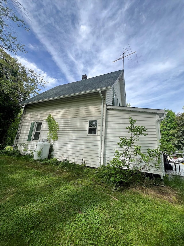 24 Rte 217, Hudson, NY 12534 - view of home's exterior featuring a chimney and a yard