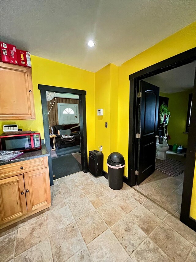 24 Rte 217, Hudson, NY 12534 - kitchen featuring stone tile flooring and dark countertops