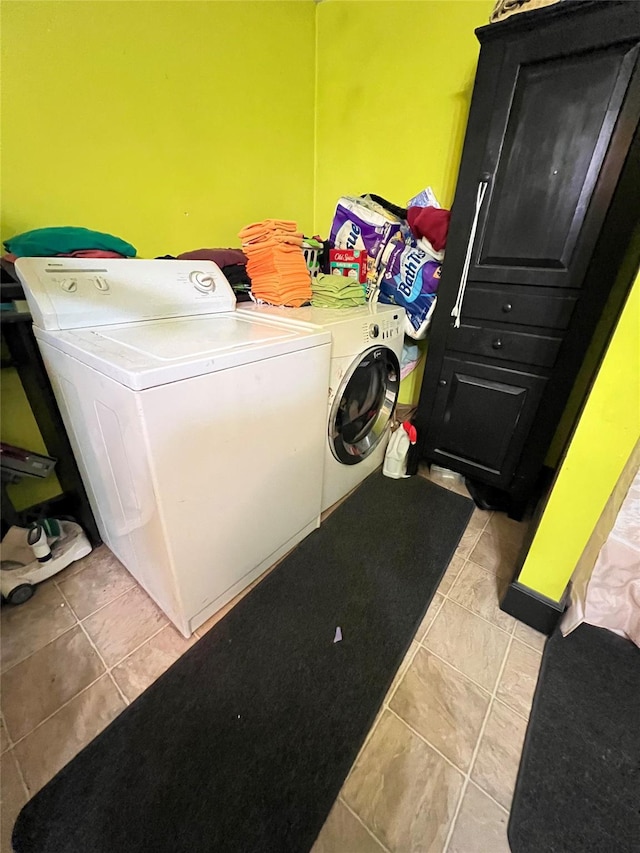 24 Rte 217, Hudson, NY 12534 - washroom featuring separate washer and dryer and light tile patterned floors