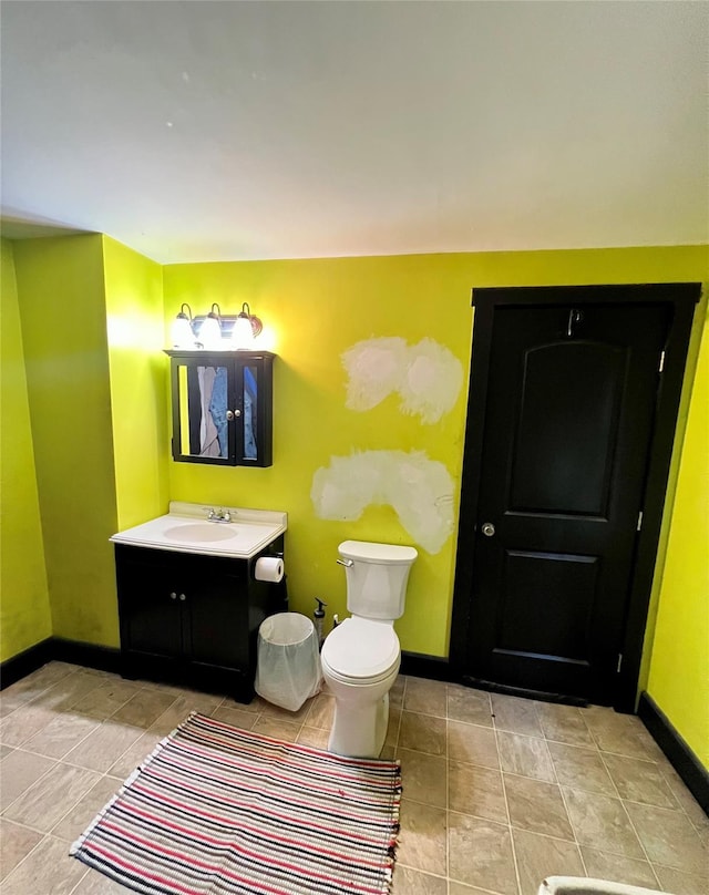 24 Rte 217, Hudson, NY 12534 - bathroom featuring vanity, baseboards, and toilet