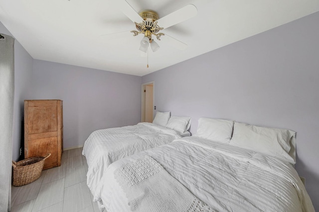 bedroom featuring a ceiling fan