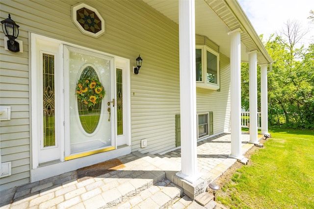 33 Roberts Rd, Wappingers Falls, NY 12590 - entrance to property with covered porch and a yard