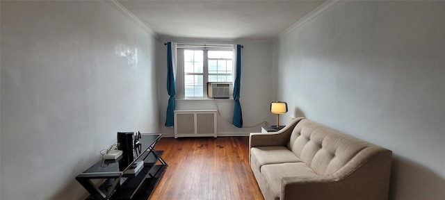 138-10 77th Ave Unit 60E, Kew Garden Hills, NY 11367 - sitting room with radiator, crown molding, wood-type flooring, and cooling unit