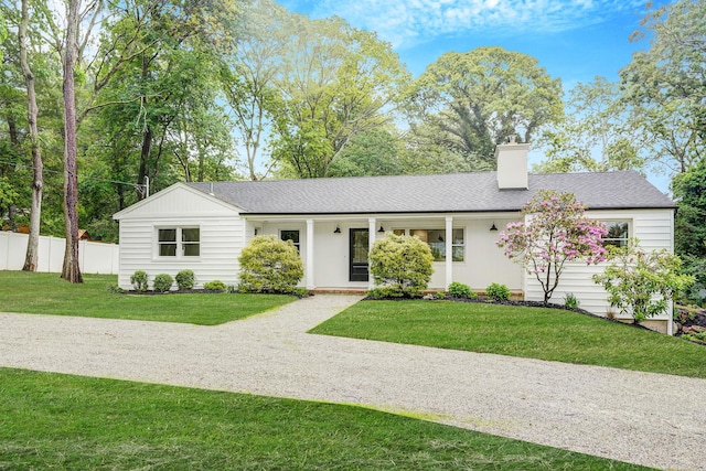 3 Thomas Dr, Wading River, NY 11792 - ranch-style house featuring a chimney, covered porch, and a shingled roof