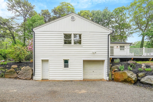 3 Thomas Dr, Wading River, NY 11792 - view of home's exterior featuring a wooden deck and a garage