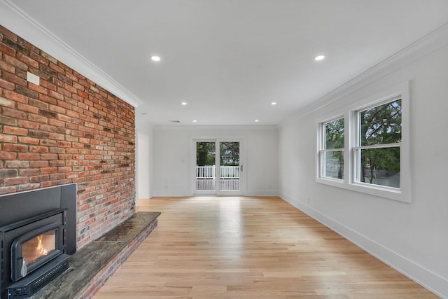3 Thomas Dr, Wading River, NY 11792 - unfurnished living room with crown molding, light wood-style floors, baseboards, and recessed lighting