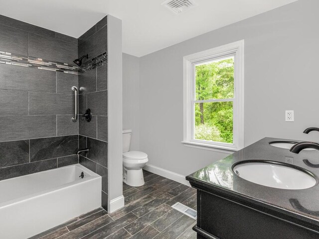 3 Idlewild Dr, Hyde Park, NY 12601 - full bath with toilet, plenty of natural light, bathtub / shower combination, and baseboards