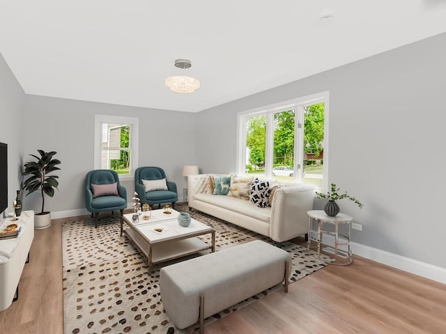 3 Idlewild Dr, Hyde Park, NY 12601 - living room with baseboards and light wood-style floors