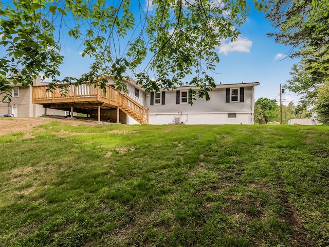 3 Idlewild Dr, Hyde Park, NY 12601 - back of property featuring a wooden deck, a yard, and stairway