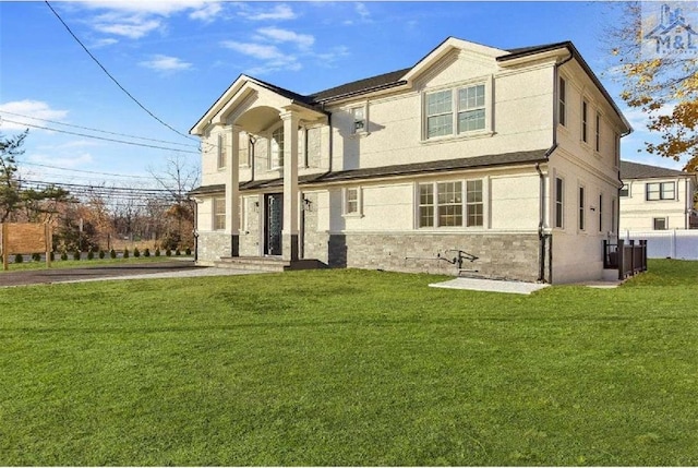 74 Walter Ave, Hicksville, NY 11801 - view of front facade featuring stone siding