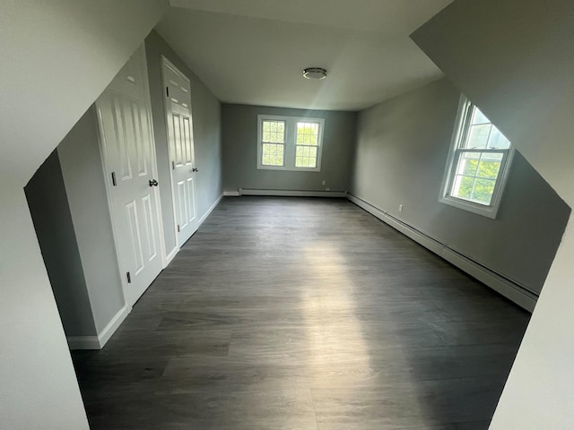 57 Doud St, Farmingdale, NY 11735 - additional living space featuring dark wood-type flooring, baseboards, and baseboard heating