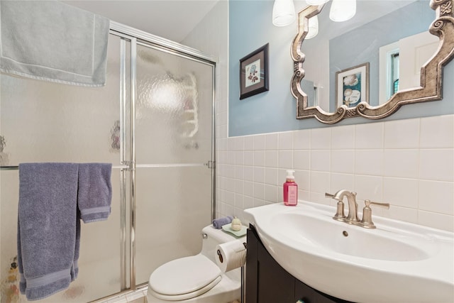 6 Carriage Path, Manorville, NY 11949 - bathroom featuring tile walls, a shower stall, toilet, and vanity
