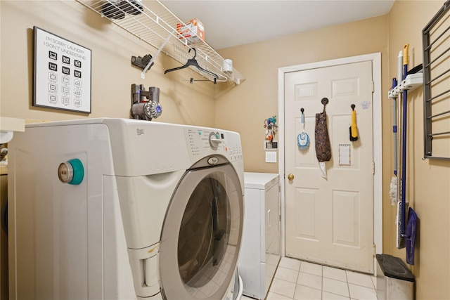 6 Carriage Path, Manorville, NY 11949 - clothes washing area featuring washer and clothes dryer and light tile patterned floors