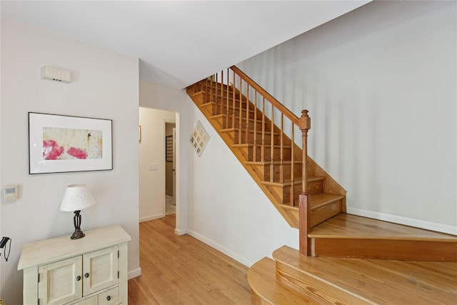 6 Carriage Path, Manorville, NY 11949 - stairway with wood finished floors and baseboards
