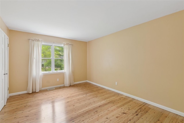 6 Carriage Path, Manorville, NY 11949 - empty room with light wood finished floors and baseboards