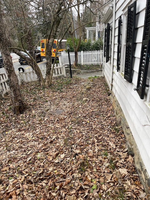 view of yard featuring fence