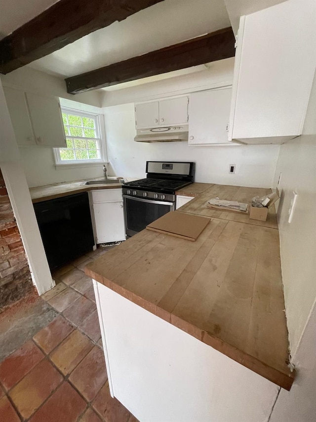 kitchen with stainless steel range with gas stovetop, a sink, beam ceiling, white cabinets, and a peninsula