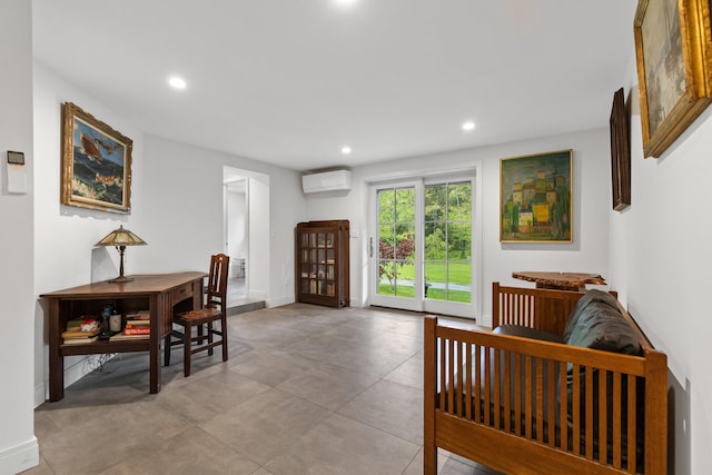 foyer featuring a wall unit AC, recessed lighting, and baseboards