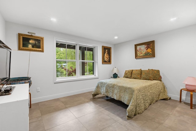 bedroom with recessed lighting, baseboards, and light tile patterned floors