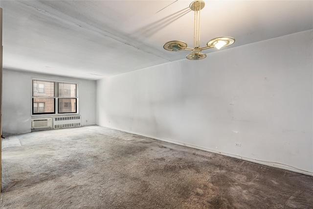 102-30 Queens Blvd Unit 3R, Forest Hills, NY 11375 - empty room with radiator heating unit, carpet, and a chandelier