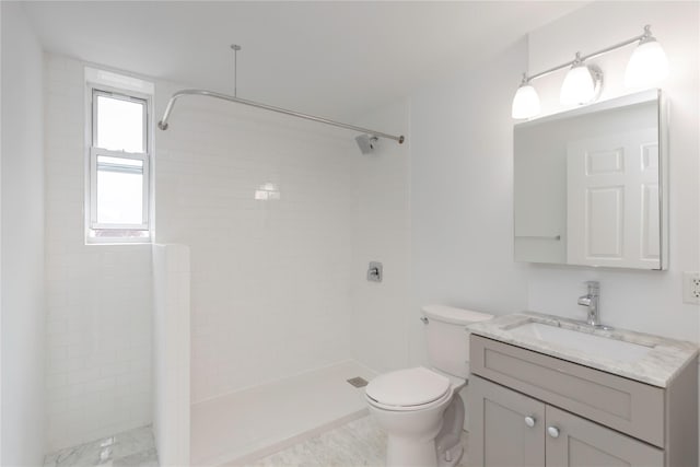 1 Hawley Ter Unit 5E, Yonkers, NY 10701 - bathroom featuring vanity, a tile shower, and toilet
