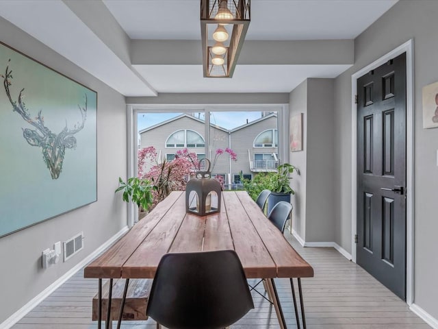 12 Deepwater Way Unit 31, Bronx, NY 10464 - dining room featuring wood-type flooring and baseboards