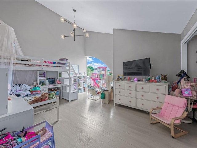 12 Deepwater Way Unit 31, Bronx, NY 10464 - bedroom featuring high vaulted ceiling and wood finished floors