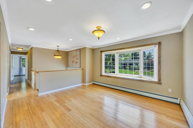 25 Terrace View Rd, Farmingdale, NY 11735 - empty room featuring a baseboard heating unit, ornamental molding, baseboards, recessed lighting, and light wood finished floors