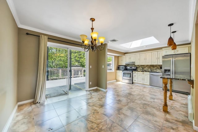 25 Terrace View Rd, Farmingdale, NY 11735 - kitchen with stainless steel appliances, a skylight, baseboards, a chandelier, and crown molding