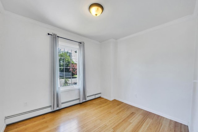 25 Terrace View Rd, Farmingdale, NY 11735 - spare room with wood finished floors, ornamental molding, baseboard heating, and baseboards