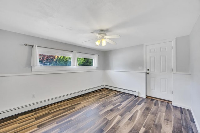 25 Terrace View Rd, Farmingdale, NY 11735 - spare room featuring ceiling fan, wood finished floors, and baseboard heating