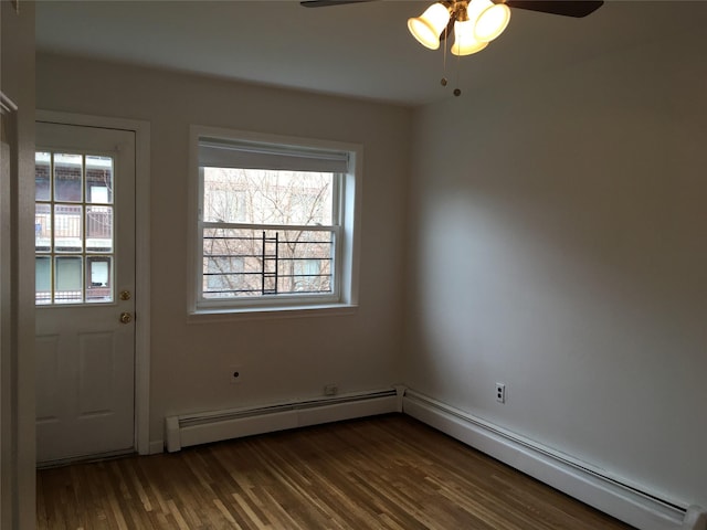 3314 Wickham Ave, Bronx, NY 10469 - entryway with healthy amount of natural light, dark wood-style flooring, a ceiling fan, and baseboard heating