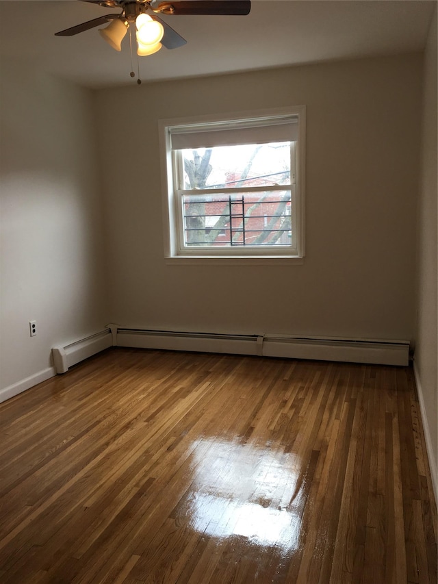 3314 Wickham Ave, Bronx, NY 10469 - unfurnished room with ceiling fan, wood finished floors, baseboard heating, and baseboards
