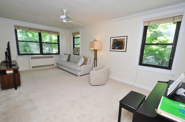 67 Rockledge Rd Unit 2A, Hartsdale, NY 10530 - living area featuring radiator heating unit, carpet floors, ceiling fan, ornamental molding, and healthy amount of natural light