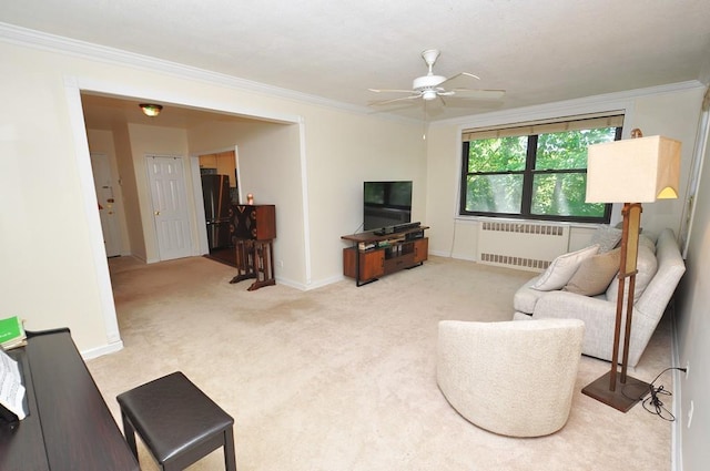 67 Rockledge Rd Unit 2A, Hartsdale, NY 10530 - carpeted living area with radiator, ornamental molding, a ceiling fan, and baseboards