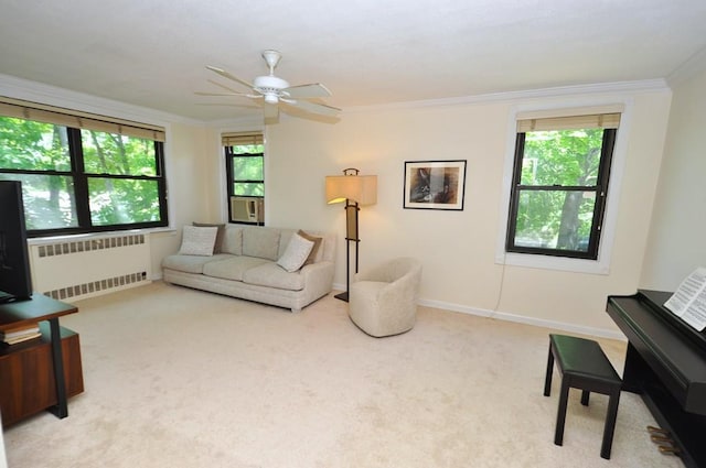 67 Rockledge Rd Unit 2A, Hartsdale, NY 10530 - carpeted living area featuring radiator heating unit, plenty of natural light, crown molding, ceiling fan, and baseboards