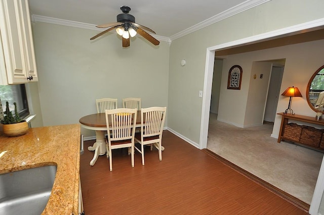 67 Rockledge Rd Unit 2A, Hartsdale, NY 10530 - dining area featuring a ceiling fan, crown molding, wood finished floors, and baseboards